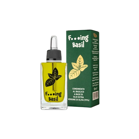 Eine Tropfflasche aus Glas mit der Aufschrift „Olivenöl Galantino F***ing Basil“ und einer Basilikumblatt-Grafik, dargestellt neben einer dazu passenden grünen Schachtel mit demselben Text, einer Basilikum-Illustration und Produktdetails – ideal, um Galantinos natives Olivenöl extra mit Basilikumöl hervorzuheben oder als köstliche Basilikum-Würzmischung zu präsentieren.