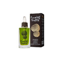 Eine Flasche Galantino Olivenöl Galantino F***ing Truffle, ein natives Olivenöl extra mit Trüffelgeschmack und Tropfverschluss, wird neben ihrer schwarzen Schachtel mit einer Trüffelillustration und einem passenden Branding gezeigt.